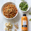 BioMax product ingredients laid out, showcasing natural elements